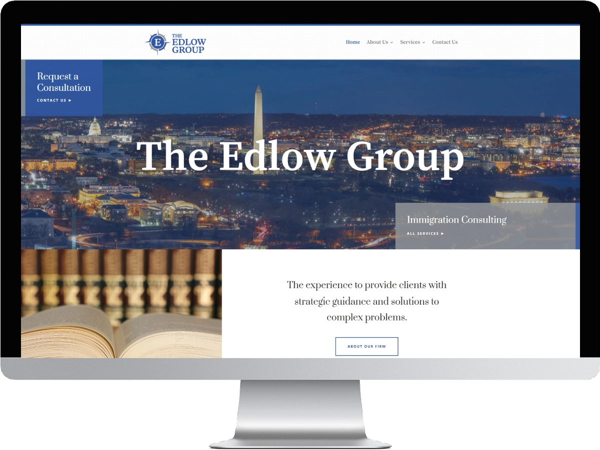 The Edlow Group website mockup on a desktop screen