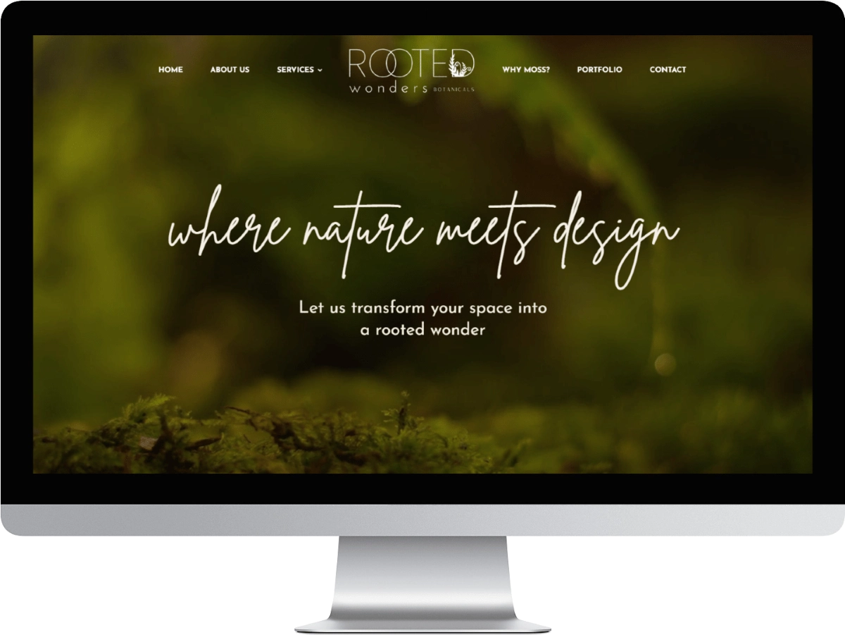 Rooted Wonders website mockup on desktop screen